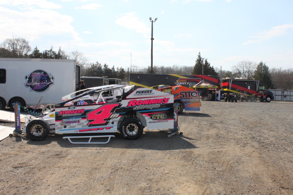 A modified car is staying in the pit